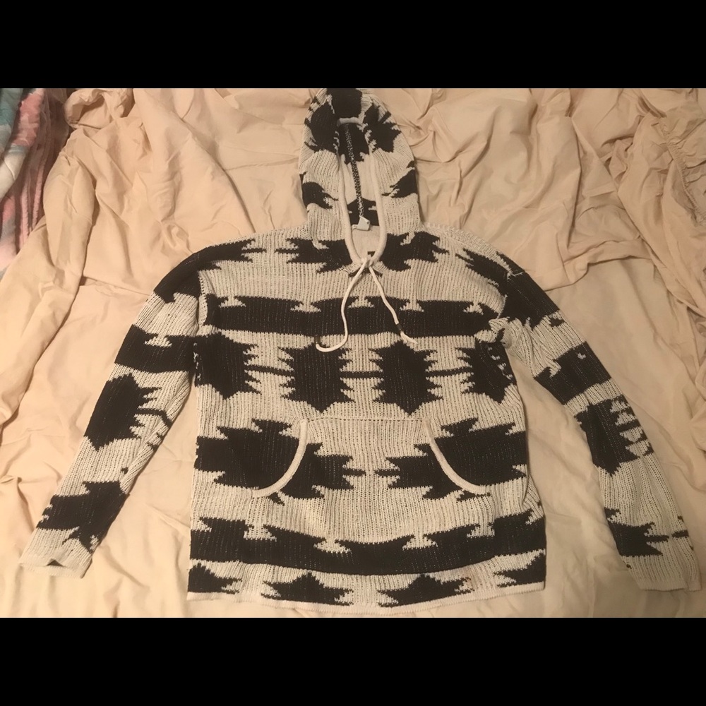 Hoodie with tribal print. Barley ever worn.